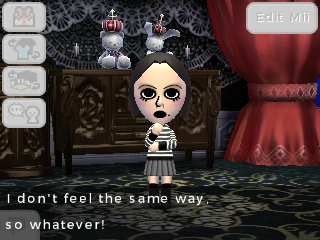 Invader Kim in her gothic themed room wearing a black and white sweater + skirt with boots saying: I dont feel the same way, so whatever!